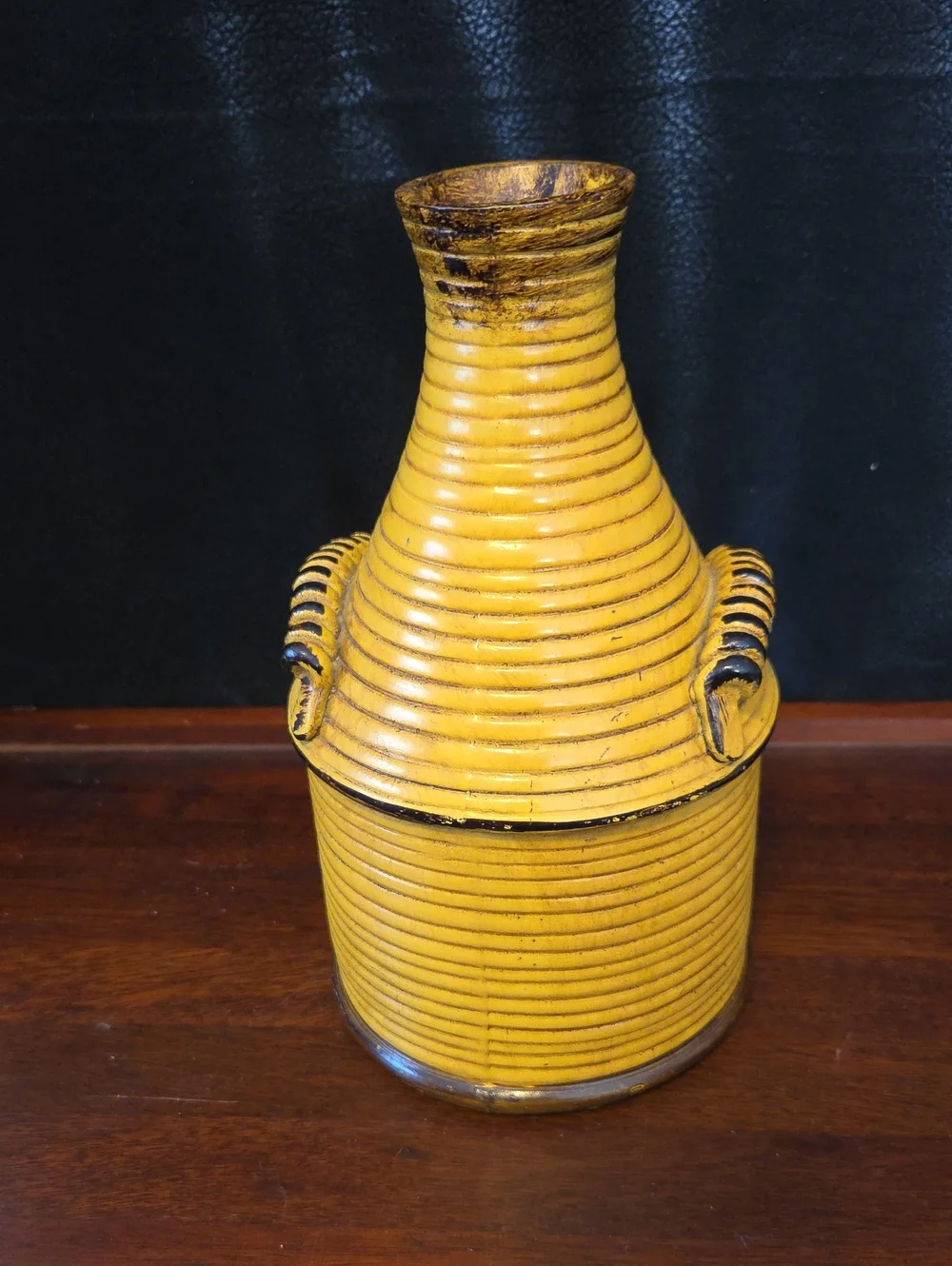 Kirklands Yellow Ribbed Resin Loop-Handled Vase